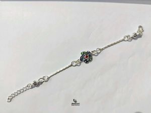 Pure Silver Rakhi with Flower Charm