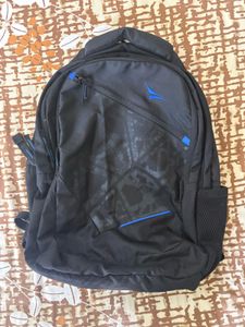 Stylish Grey Backpack with Geometric Design