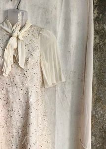 Sparkling White Dress with Bow Detail
