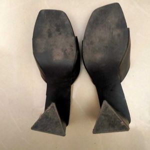 black triangular heels