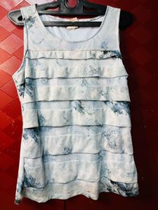 Tiered Ruffle Sleeveless Top