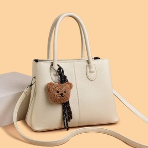 Chic Black Tote Bag with Bear Charm