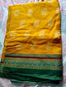 Vibrant Yellow Saree with Green Border