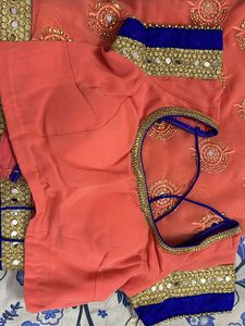 Coral And Blue Georgette Heavy Work Saree