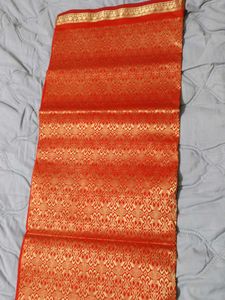 Vibrant Orange Saree with Gold Border