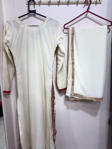 Elegant White Kurta Set with Intricate Embellishme
