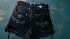 Black Denim Shorts with Fringe and Grommets