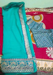 Elegant Teal Saree with Golden Border