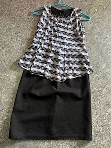 Chic Black & White Peplum Dress
