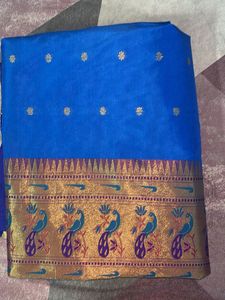 Vibrant Blue Silk Saree with Peacock Motif