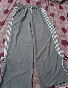 A grey flared, casual pants.
