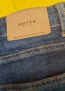 Distressed Blue Denim Jeans