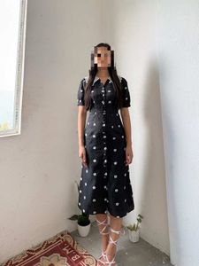 imported Chic Black Floral Midi Dress