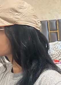 Cap with hair attached