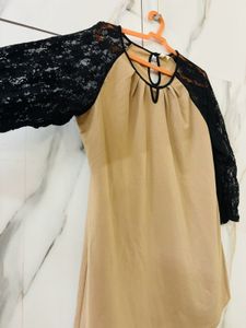 Beige Top With Black Net Sleeves