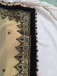A Black Border With Moti World New Sari