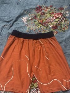 Trendy Orange Abstract Print Shorts