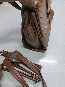 woman sling bag cara brand