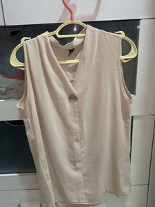 Sleeveless V-Neck Top with Button Accent