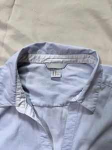 H&amp;M pastel blue fitted button-down shirt