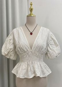 White Peplum Top with Puff Sleeves