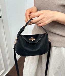 Chic Black Shoulder Bag with Gold Hardware