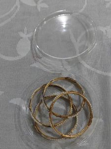 Elegant Gold Tone Bangles with Pearl Accents