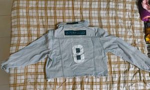 Light Wash Denim Jacket with Patches
