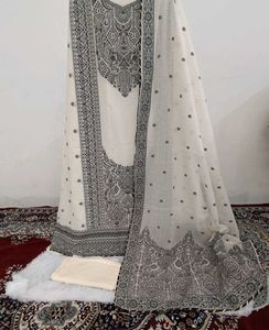 Elegant unstitched pure cotton designer suit