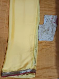 Synthetic yellow saree with stitched blouse
