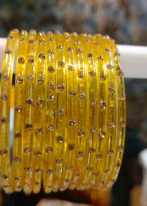Elegant Yellow Bangles with Sparkling Embellishmen