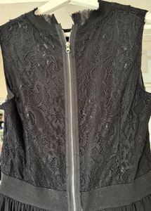 Elegant Black Pleated Maxi Dress by Madame