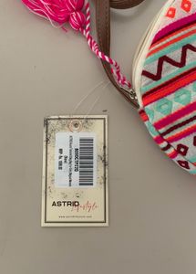 Astrid round Geometric print sling bag for women