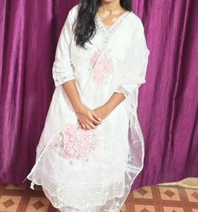 a beautiful white kurta set