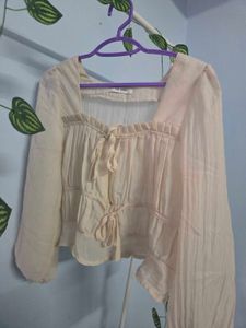 cream blouse tied top