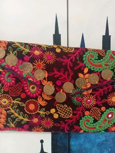 Embroidered Sling Bag.