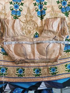 Beige Lehenga Choli with Blue Floral Embroidery