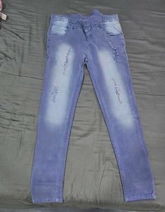 Distressed Light Wash Denim Jeans