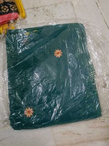 Elegant Teal Saree with Floral Embroidery