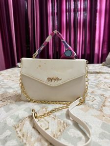 Stylish White Handbag with Scarf Detail