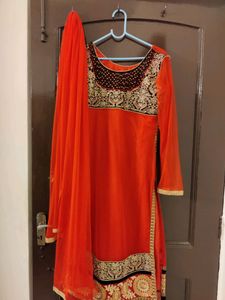 Elegant Orange &amp; Black Embroidered Salwar Kameez