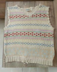 UNISEX KIDS SLEEVELESS SWEATER