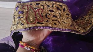 Gorgeous Purple Embroidered net  Saree