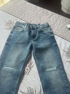 Distressed Blue Denim Jeans