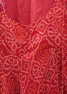red stitched gown