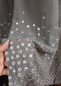 Elegant Grey draped gown with Embellishments