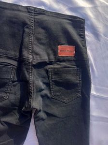 High Waisted Buttoned Jeans