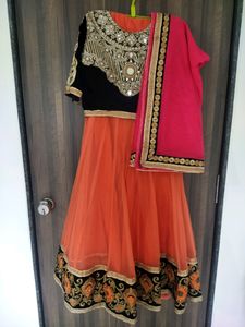 Velvet blouse with net dupatta and lahenga.    nav