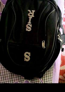 Black Backpack with "SIR S" Logo