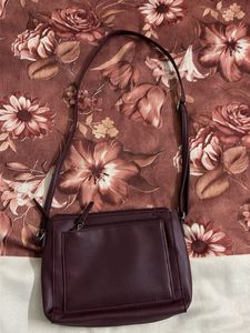 Caprese Burgundy leather sling bag
